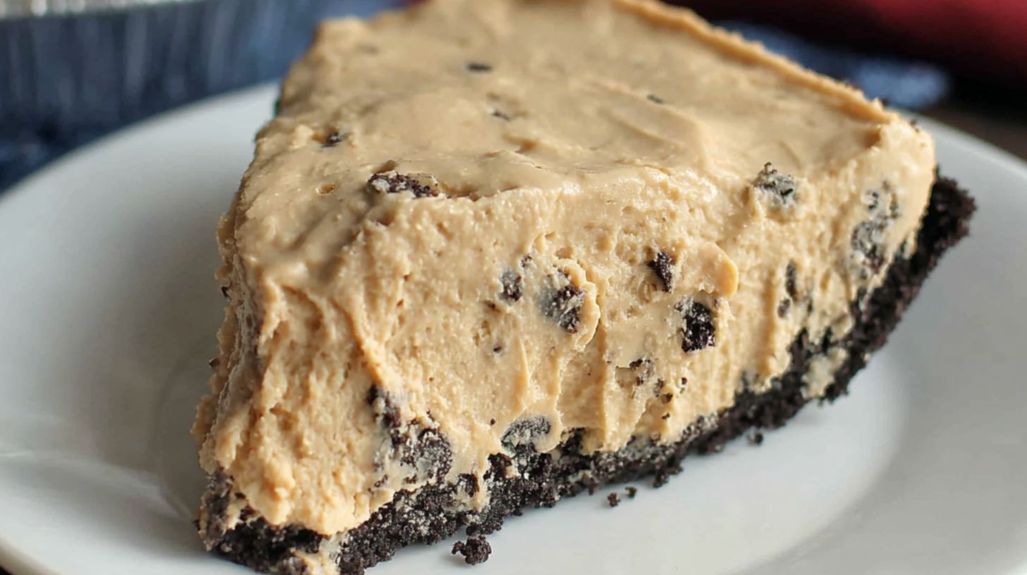 Extreme close-up of rock bottom pie slice with Oreo crust and peanut butter filling
