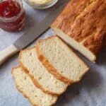 Sliced high protein bread with jam and butter on the side