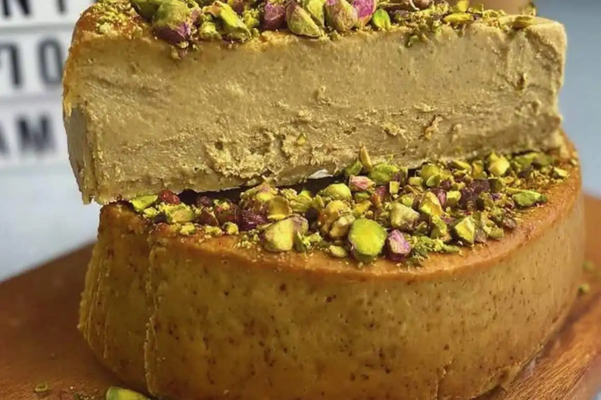 High protein pistachio cheesecake topped with chopped pistachios