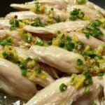 Steamed chicken recipe topped with ginger onion sauce