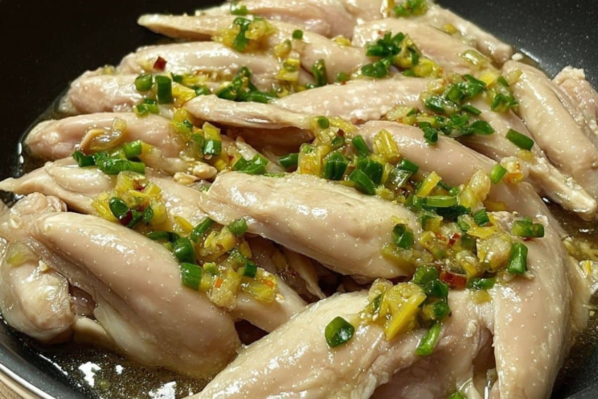 Steamed chicken recipe topped with ginger onion sauce