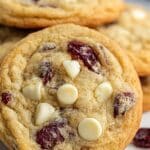 Cranberry white chocolate cookies close-up with golden edges and creamy white chips