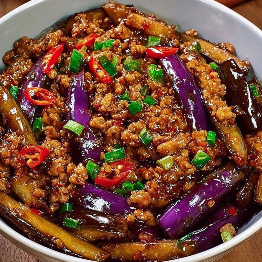 Minced beef and eggplant stir-fry served in a white bowl