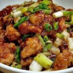Scallion chicken recipe with juicy chicken and scallions in a glossy sauce