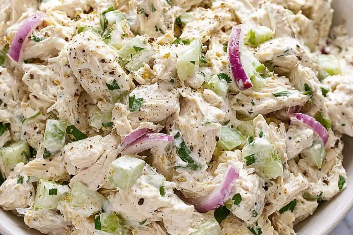 Chicken salad recipe with celery, red onion, and creamy dressing