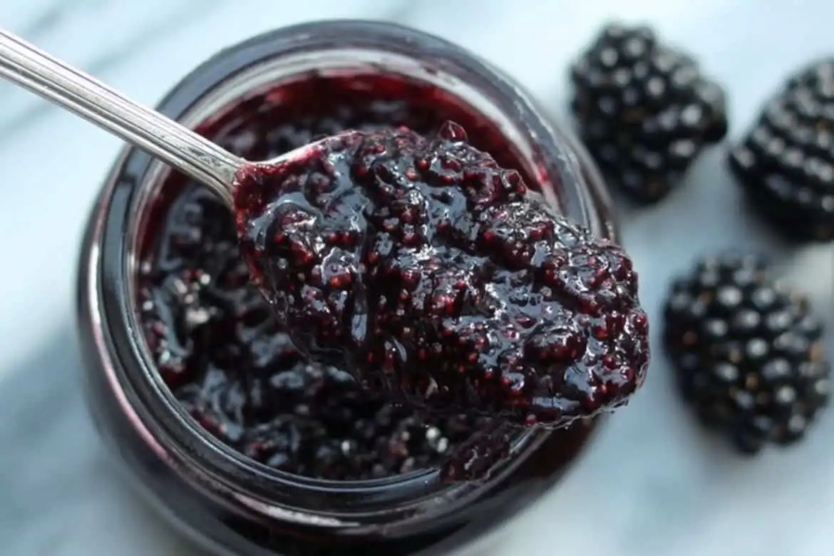 Blackberry Jam Recipe Without Pectin thick homemade jam on spoon