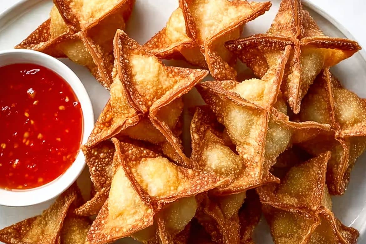 Crab rangoon recipe served crispy and golden with sweet chili sauce